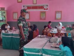 Pendampingan Babinsa Koramil 1315-01 Telaga Pastikan Distribusi Makan Bergizi Gratis Berjalan Lancar Di Sekolah Telaga Biru
