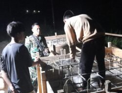 Semangat Gotong Royong Koramil Limboto Bersama Warga Lakukan Lembur Pemasangan Blok Angkur Untuk Program Pemerintah Pusat