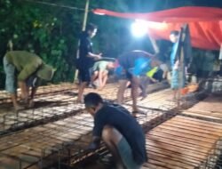 Semangat Lembur Personel Koramil Telaga Dan Pekerja Warnai Percepatan Pembangunan Jembatan Garuda Kecamatan Telaga Biru