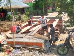 Pembangunan Jembatan Gantung Ulapato B Terus Berjalan Personel Koramil Telaga Bersama Warga Fokus Pada Struktur Beton Bertulang