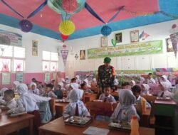 Pendampingan Babinsa Koramil 1315-01 Telaga Sukseskan Pembagian Makan Bergizi Gratis Bagi Siswa Kecamatan Telaga Guna Wujudkan Anak Sehat Kuat dan Berprestasi