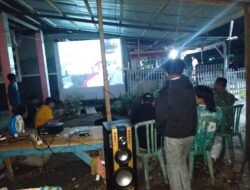 Semangat Kebersamaan Terjalin Saat Personel Koramil 1315-03/Tabongo Nonton Bareng Curaçao Vs Pantai Gading Bersama Warga Desa Dunggala