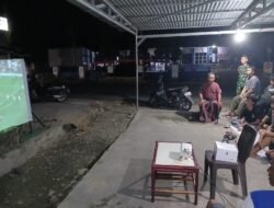 Nonton Bareng Tunisia Kontra Belanda Pererat Kedekatan Personel Kodim 1315 Gorontalo Bersama Warga Desa Batudaa