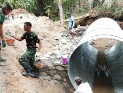 Koramil 1315-05/Boliyohuto Kawal Pembangunan Fondasi Jembatan Garuda Armco Untuk Lancarkan Mobilitas Warga Desa Iloheluma