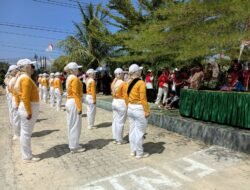 Pengamanan Babinsa Koramil Tibawa Dukung Kelancaran Gerak Jalan SMA, SMK, Karang Taruna, Dan PKK Pulubala