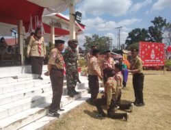 Kemah Pramuka Kecamatan Tibawa Resmi Mulai, Danramil Dorong Semangat Kemandirian Pelajar Sambut HUT RI