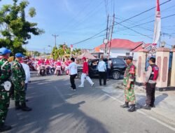 Pengamanan Pawai Karnaval Telaga Biru Libatkan Personel Koramil 1315-01 Demi Kelancaran Perayaan HUT Ke-81 Kemerdekaan RI