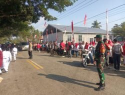 Peringatan HUT Kemerdekaan RI Ke-81 Meriah, Babinsa Tibawa Amankan Gerak Jalan Pelajar Kecamatan Pulubala